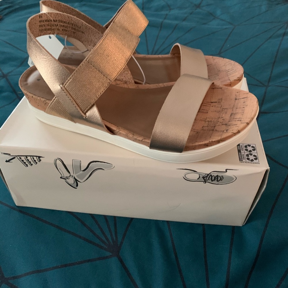 Brand new gold strappy wedges